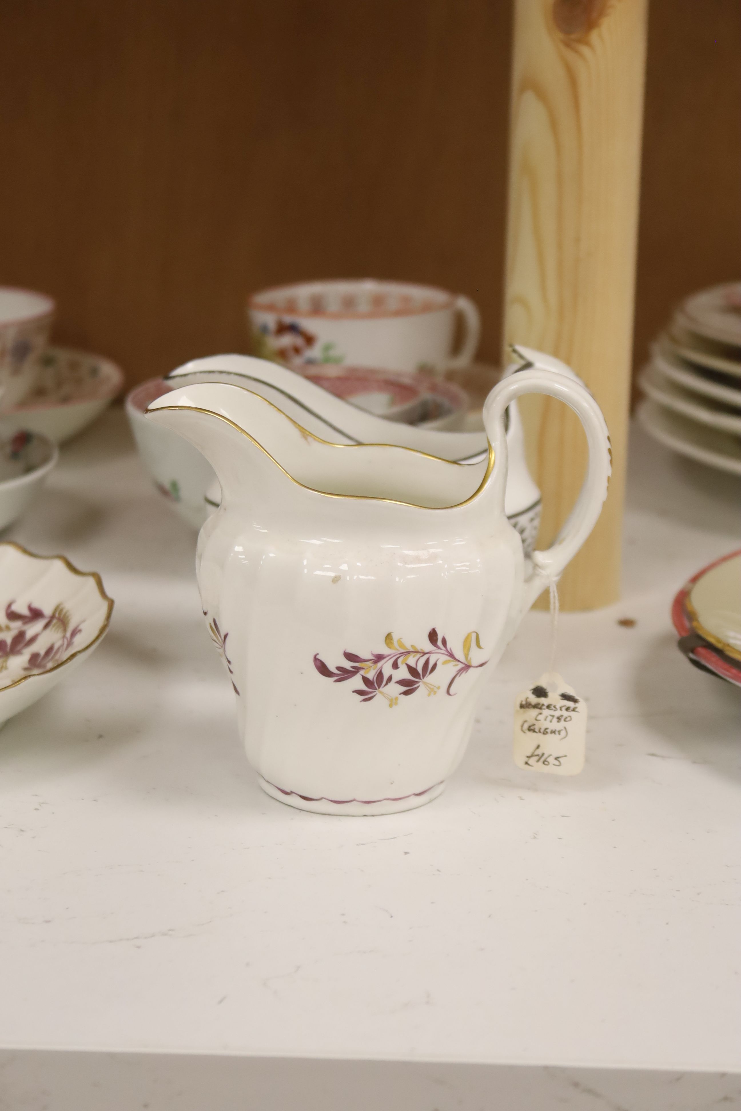 A group of late 18th / early 19th century English porcelain teaware and plates
